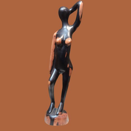 Handcrafted sculpture of a figure playing music, perfect for adding a lively and inspirational touch to your home or office decor.